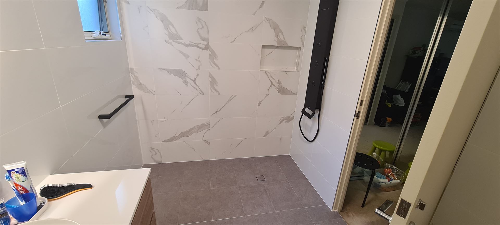 Bathroom before frameless shower screen install in Newington