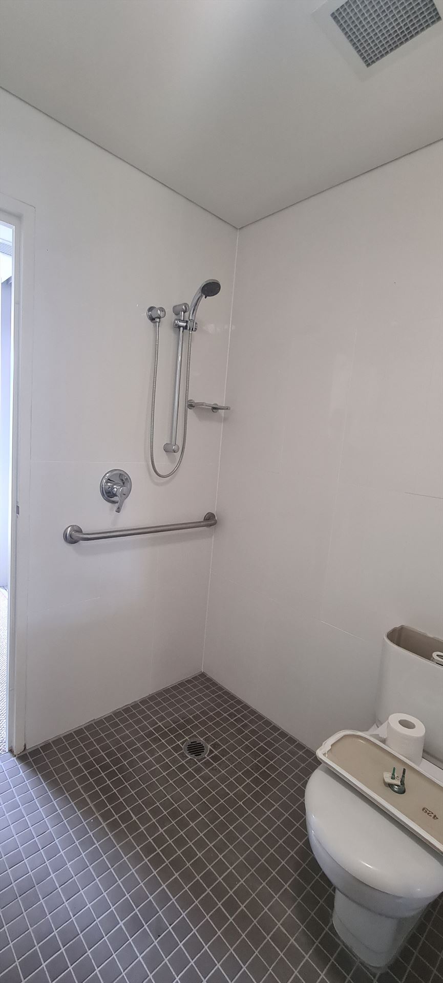 Bathroom before frameless shower screen install in Kensington