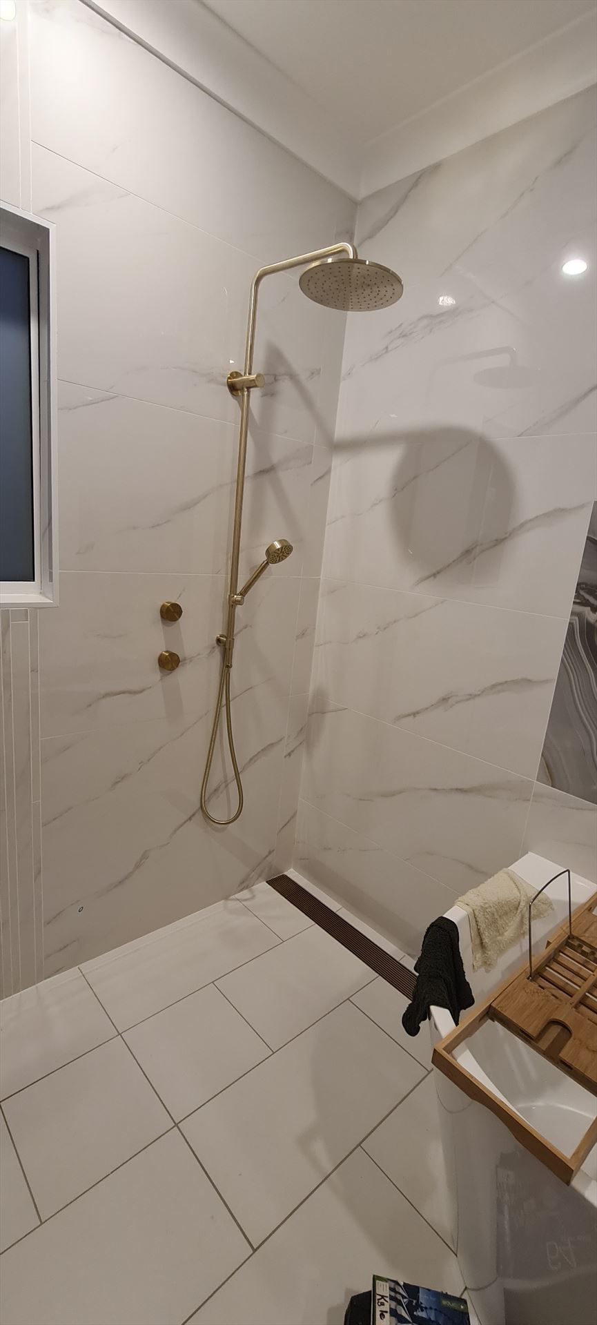 Bathroom before frameless shower screen install in Riverwood