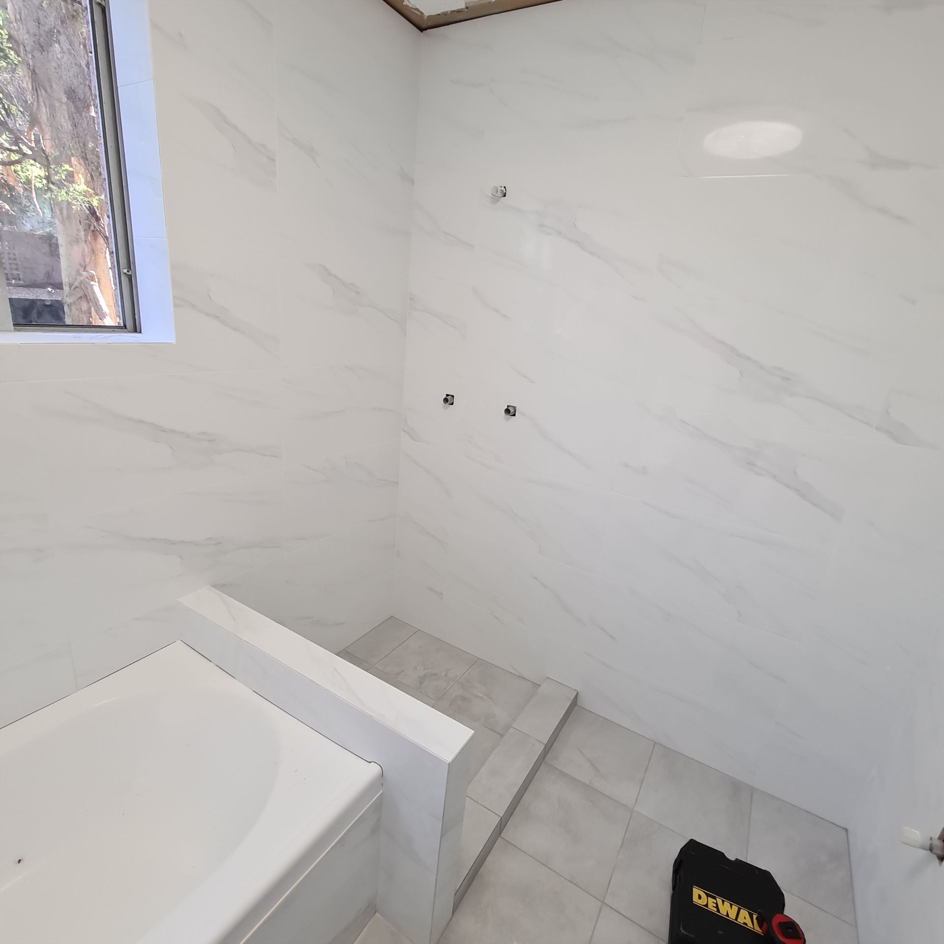 Bathroom before frameless shower screen install in Dulwich Hill