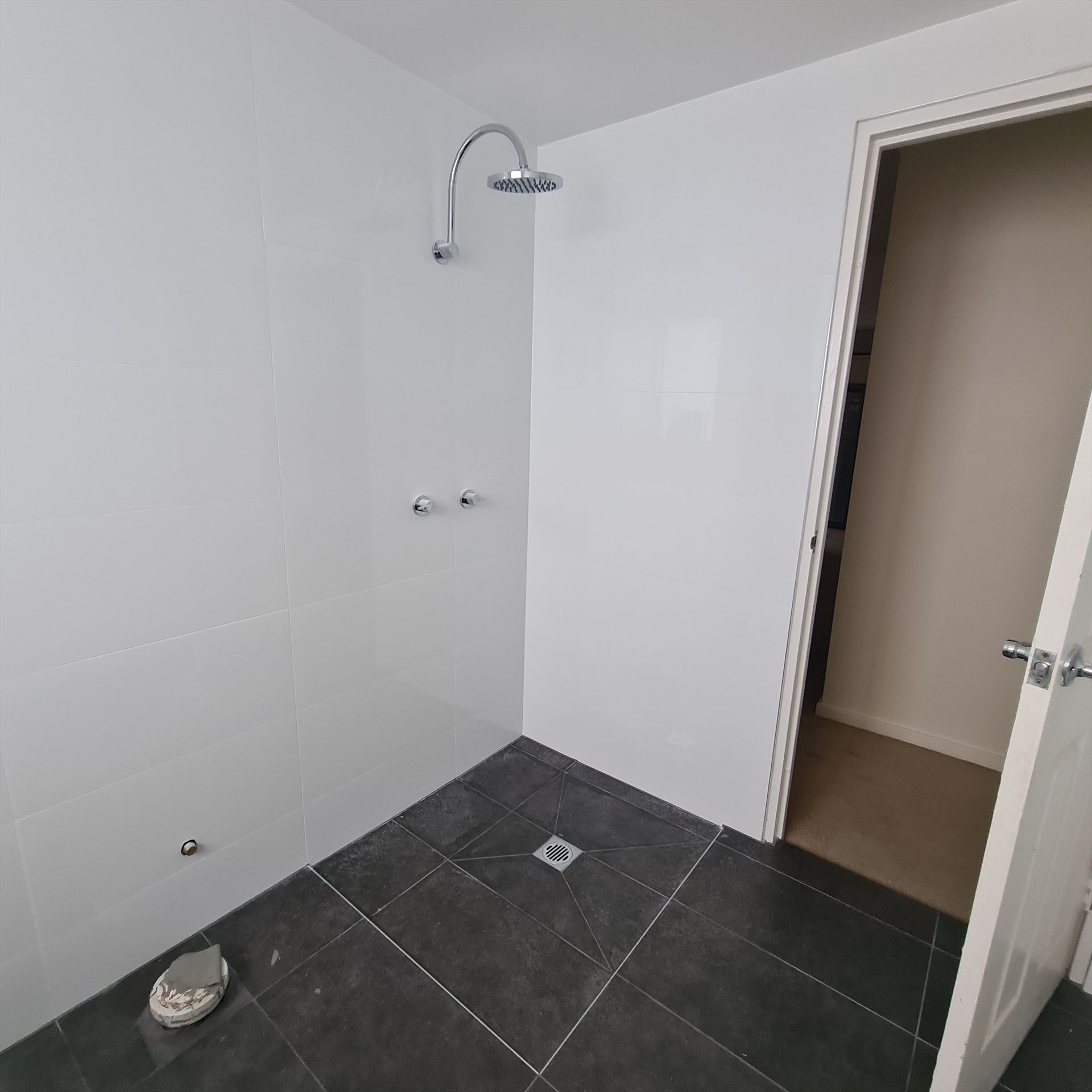 Bathroom before frameless shower screen install in Wentworthville