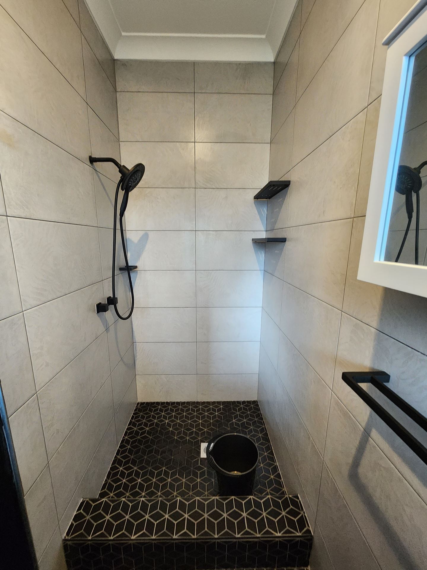 Bathroom before frameless shower screen install in Seven Hills