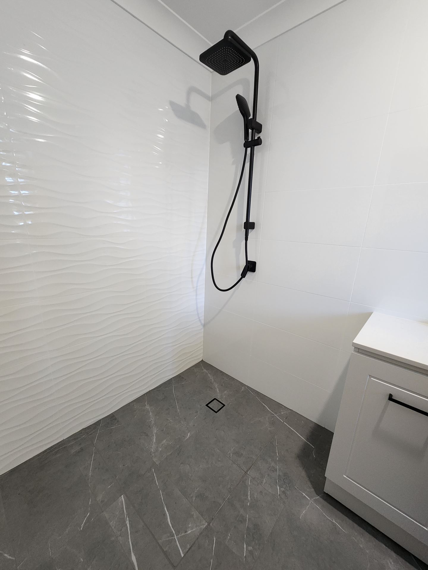 Bathroom before frameless shower screen install in Baulkham Hills