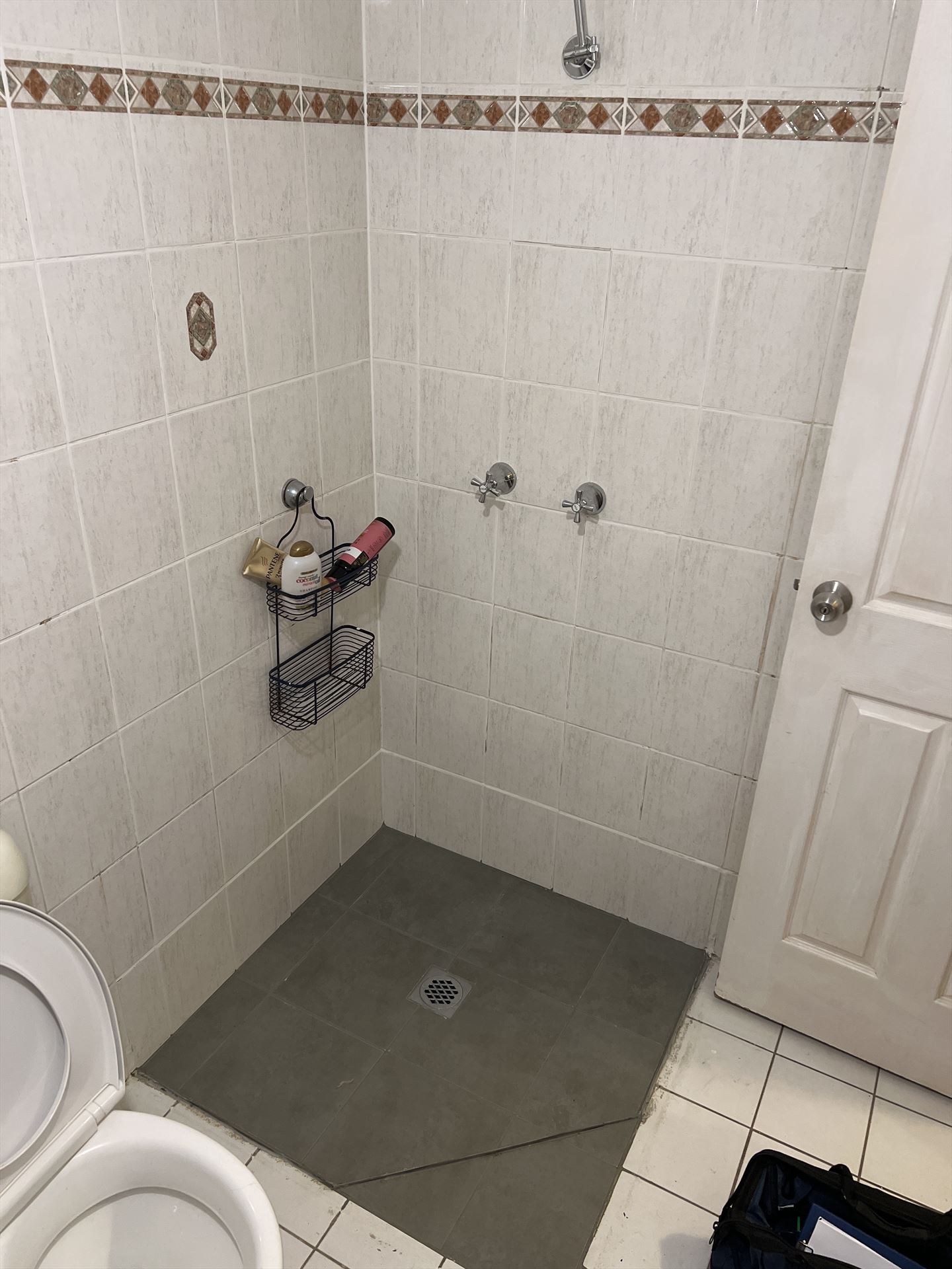 Bathroom before frameless shower screen install in Riverwood