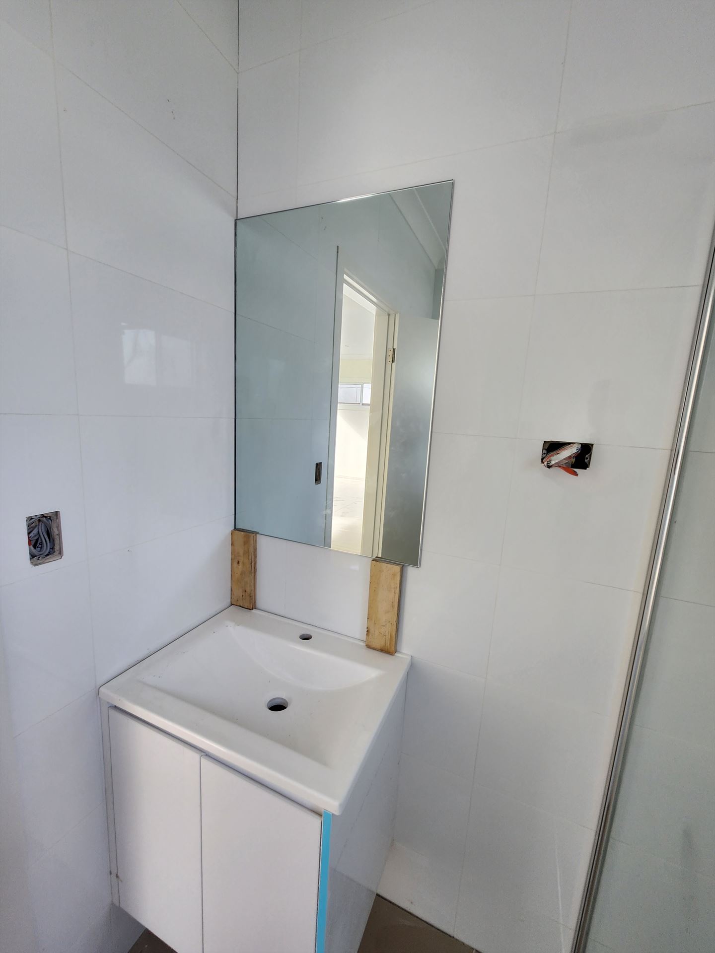 Bathroom before frameless shower screen install in Emerton