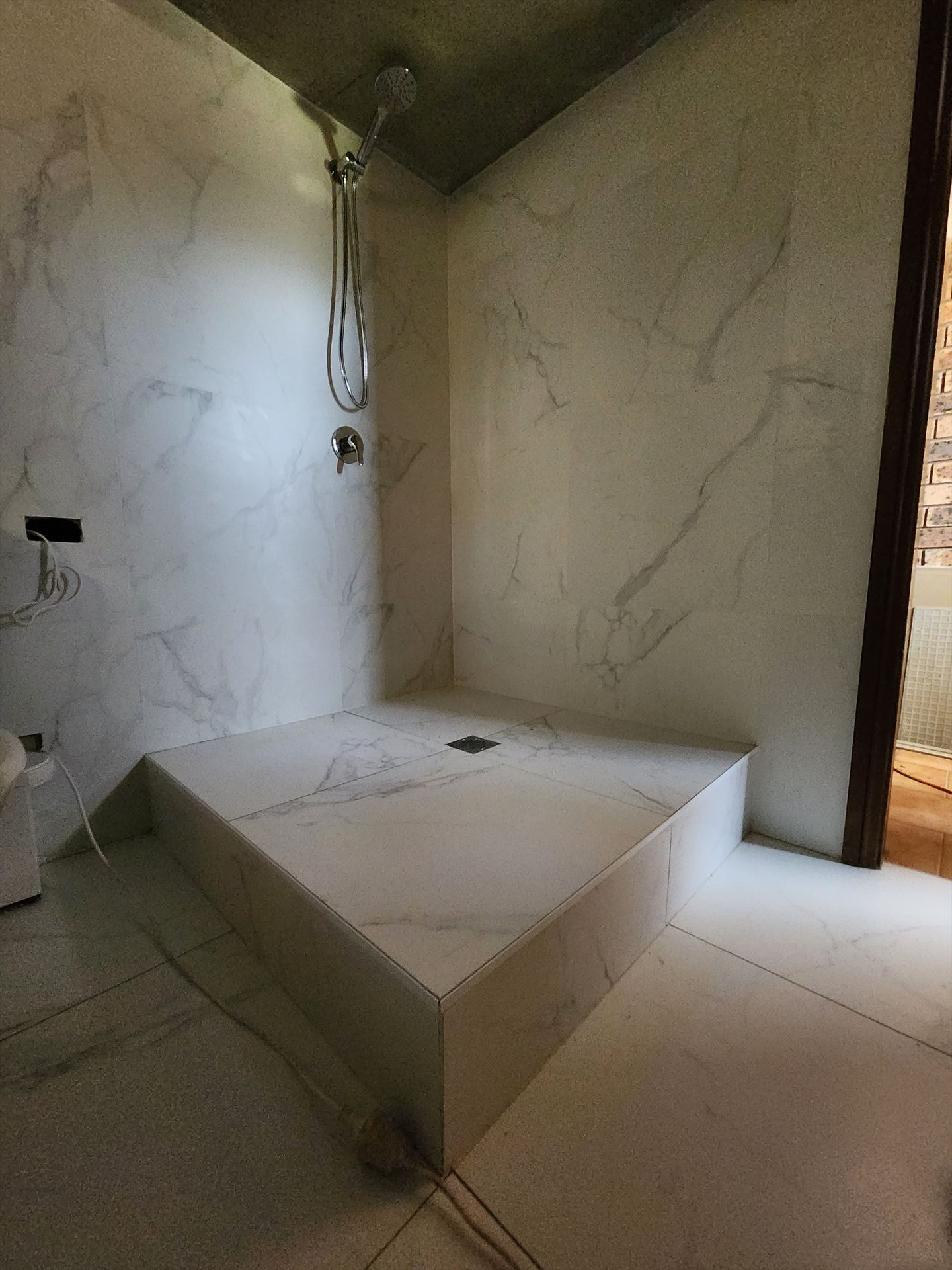 Bathroom before frameless shower screen install in Kogarah Bay