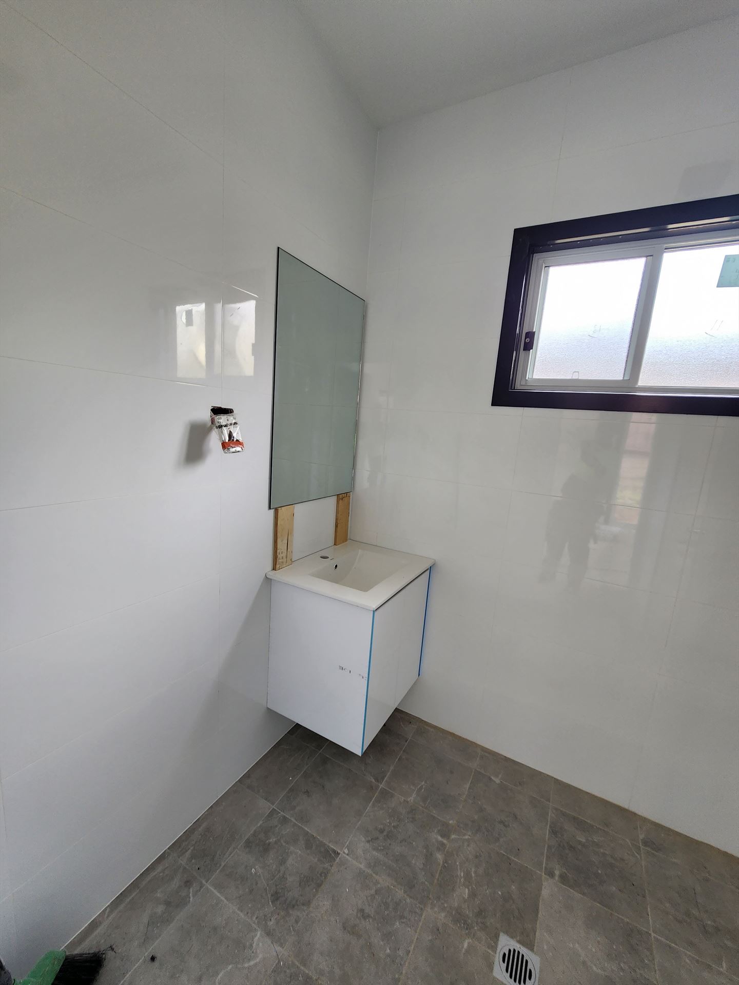 Bathroom before frameless shower screen install in Minchinbury