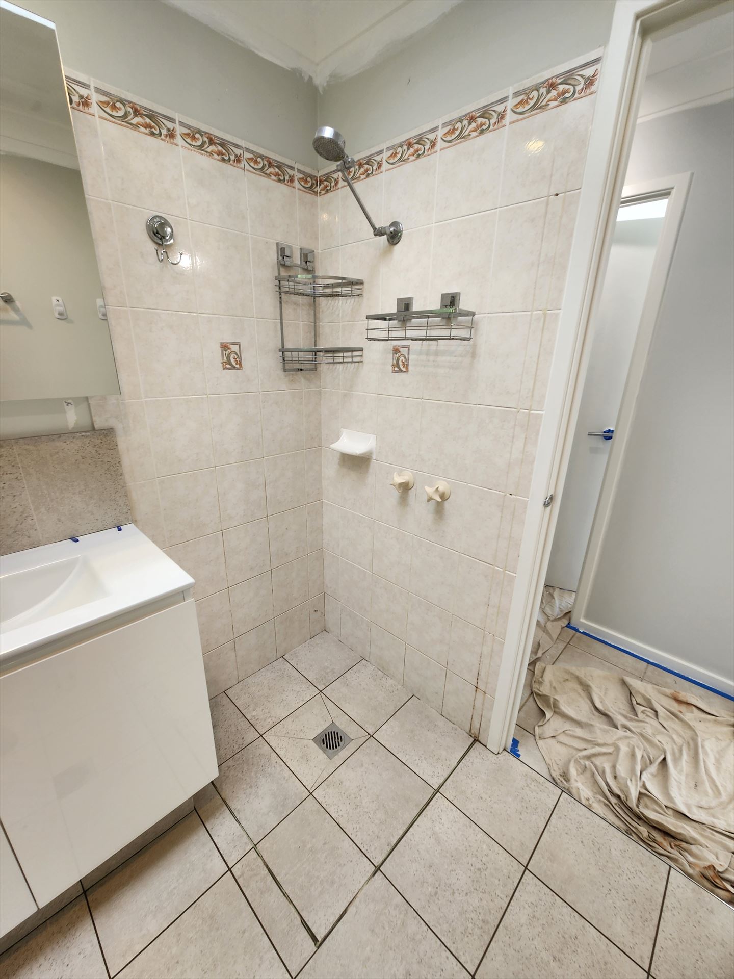 Bathroom before frameless shower screen install in Frenchs Forest