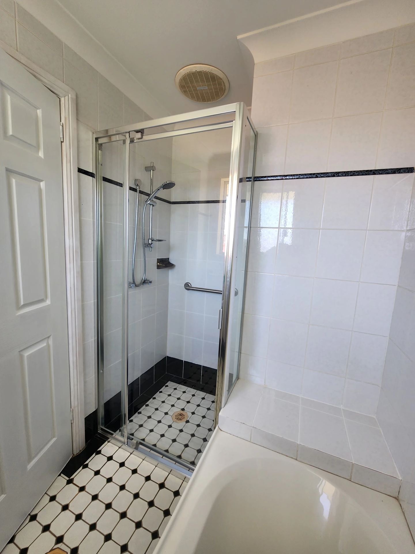 fully shower screen with chrome hardware installed in Eastwood by Showerland