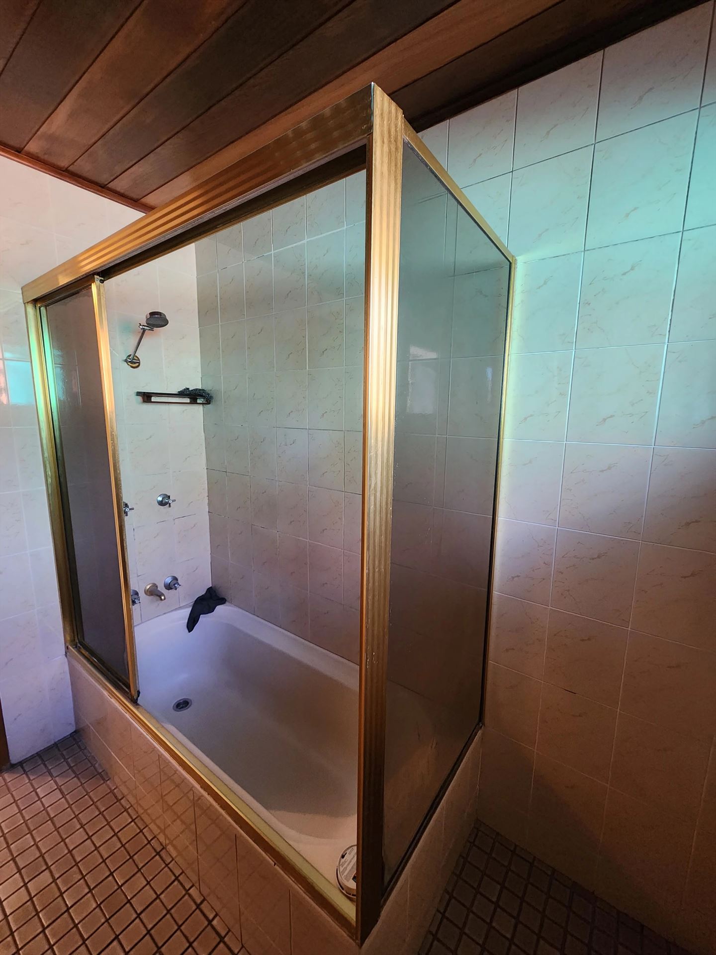 fully shower screen with gold hardware installed in Quakers Hill by Showerland