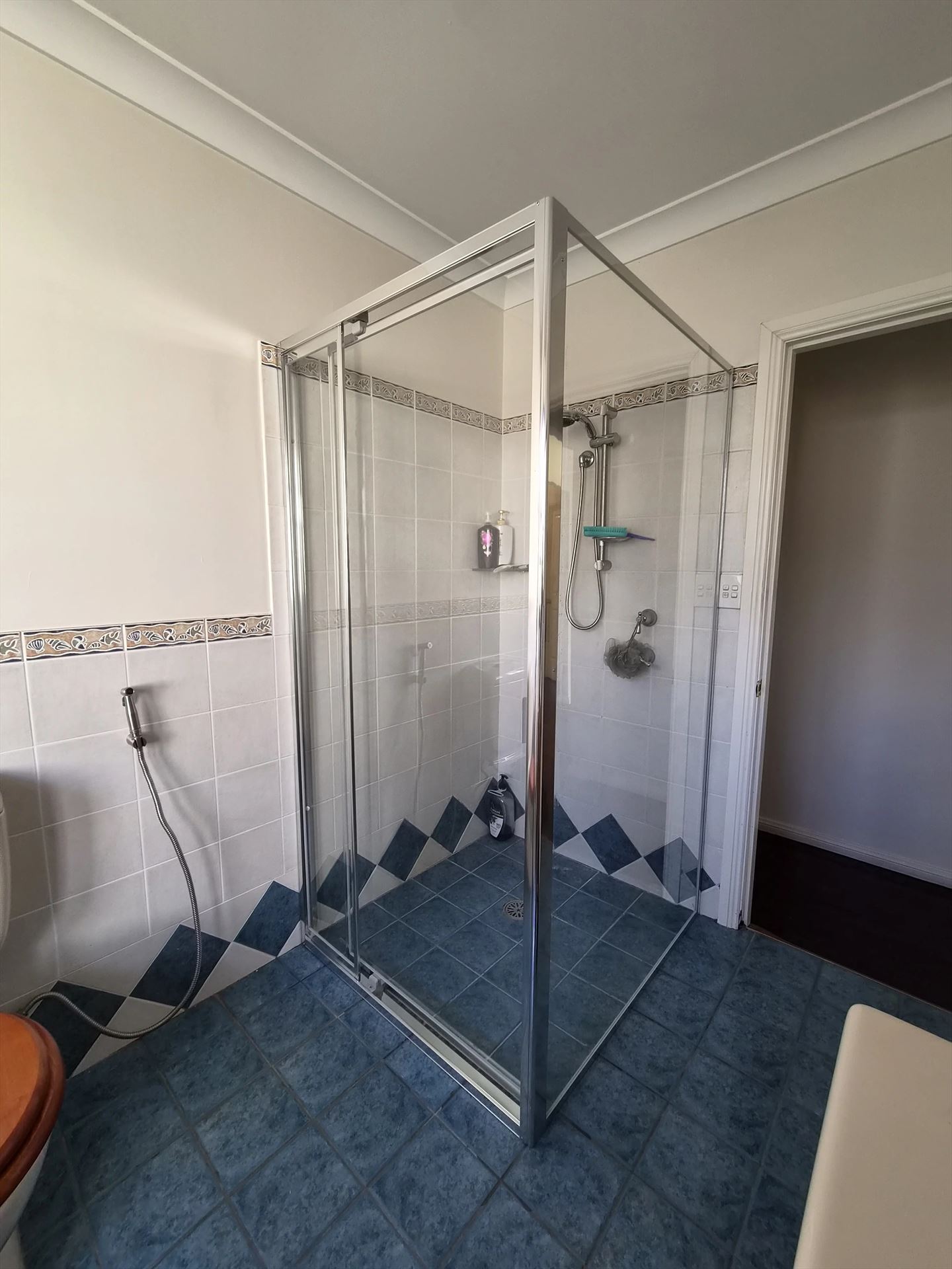 fully shower screen with chrome hardware installed in Chester Hill by Showerland