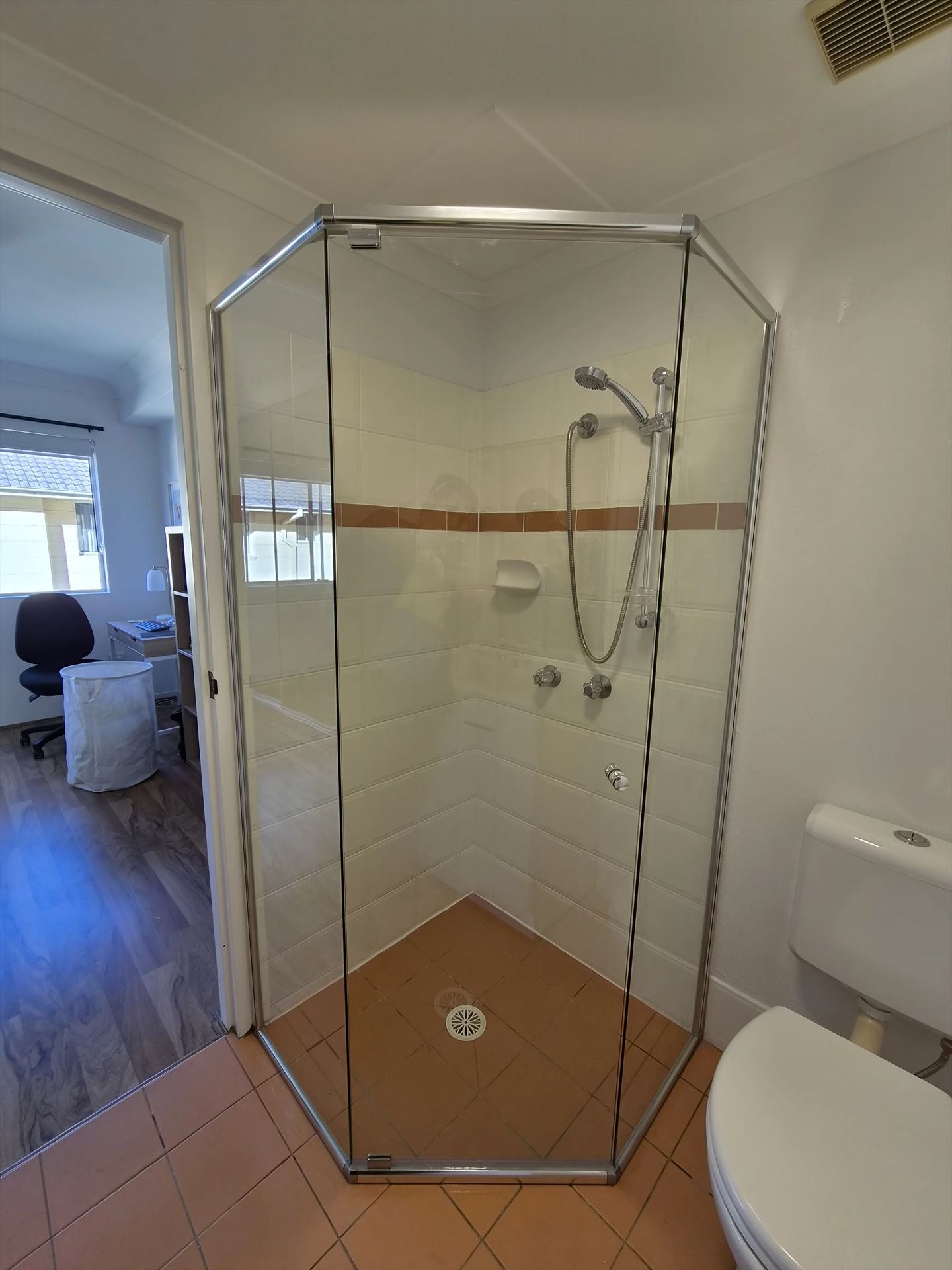 semi shower screen with chrome hardware installed in Hornsby by Showerland