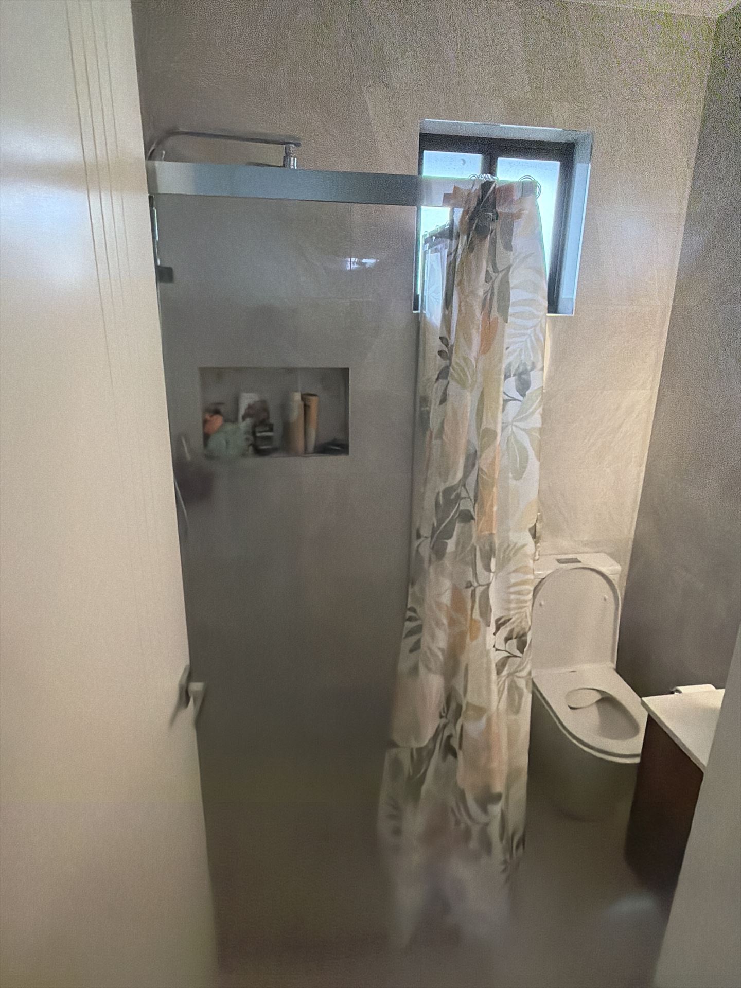 frameless shower screen with chrome hardware installed in Marsden Park by Showerland