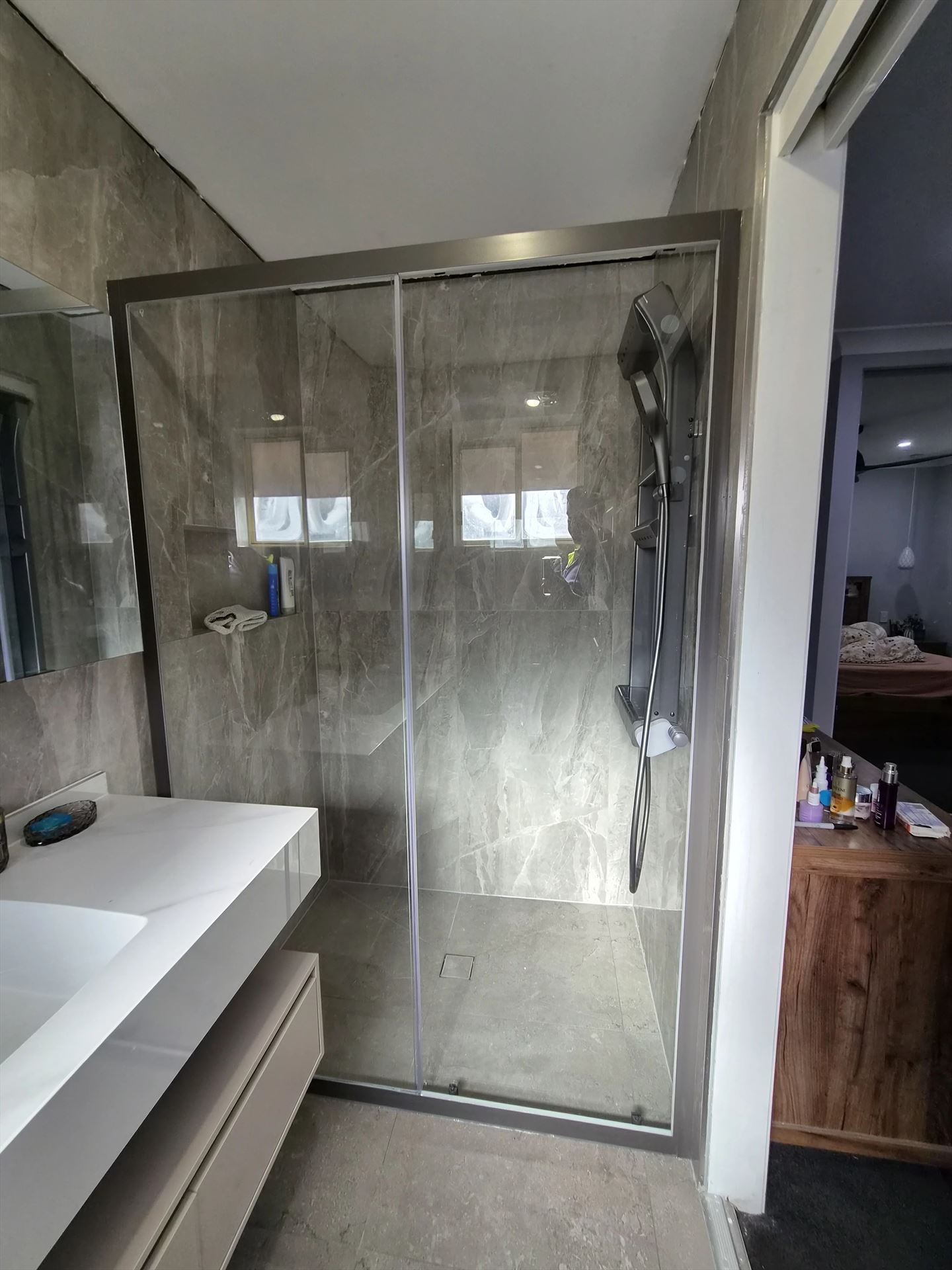 semi shower screen with chrome hardware installed in Quakers Hill by Showerland
