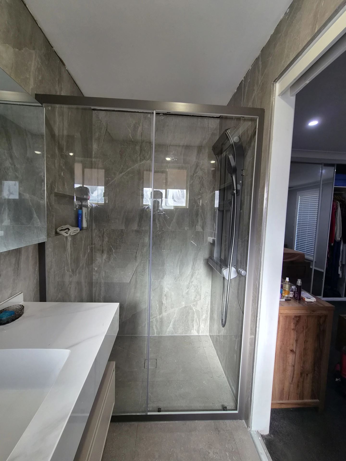semi shower screen with chrome hardware installed in Quakers Hill by Showerland
