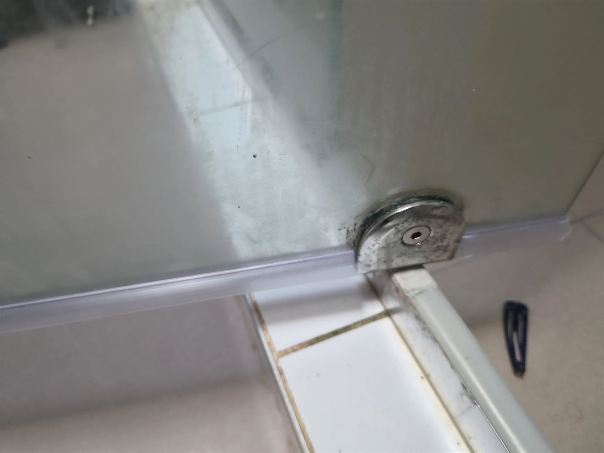 fully shower screen with white hardware installed in Kellyville by Showerland