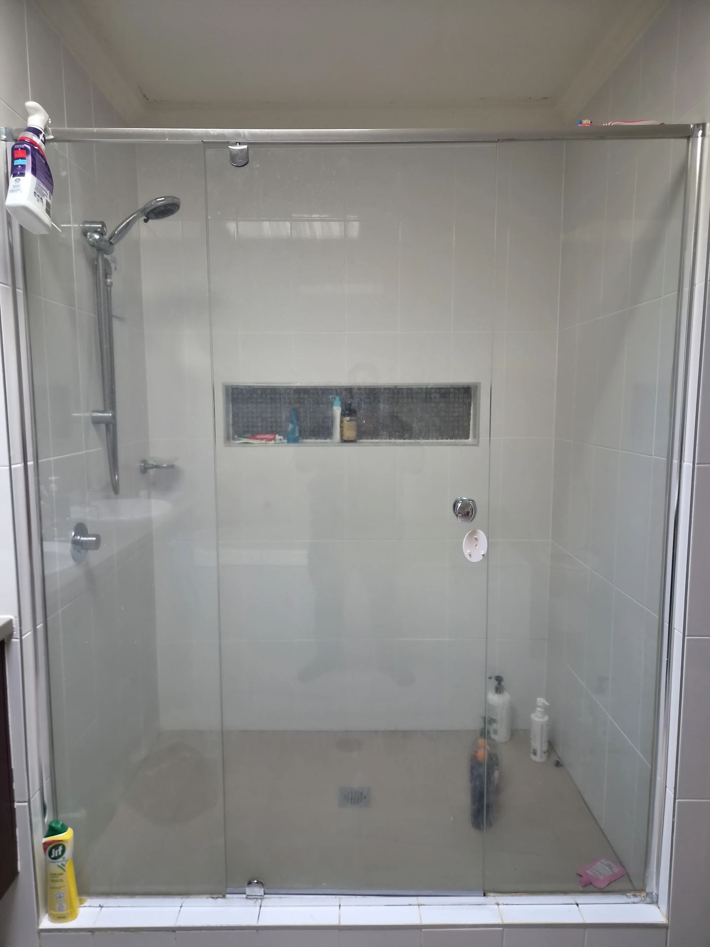 fully shower screen with chrome hardware installed in Kellyville by Showerland