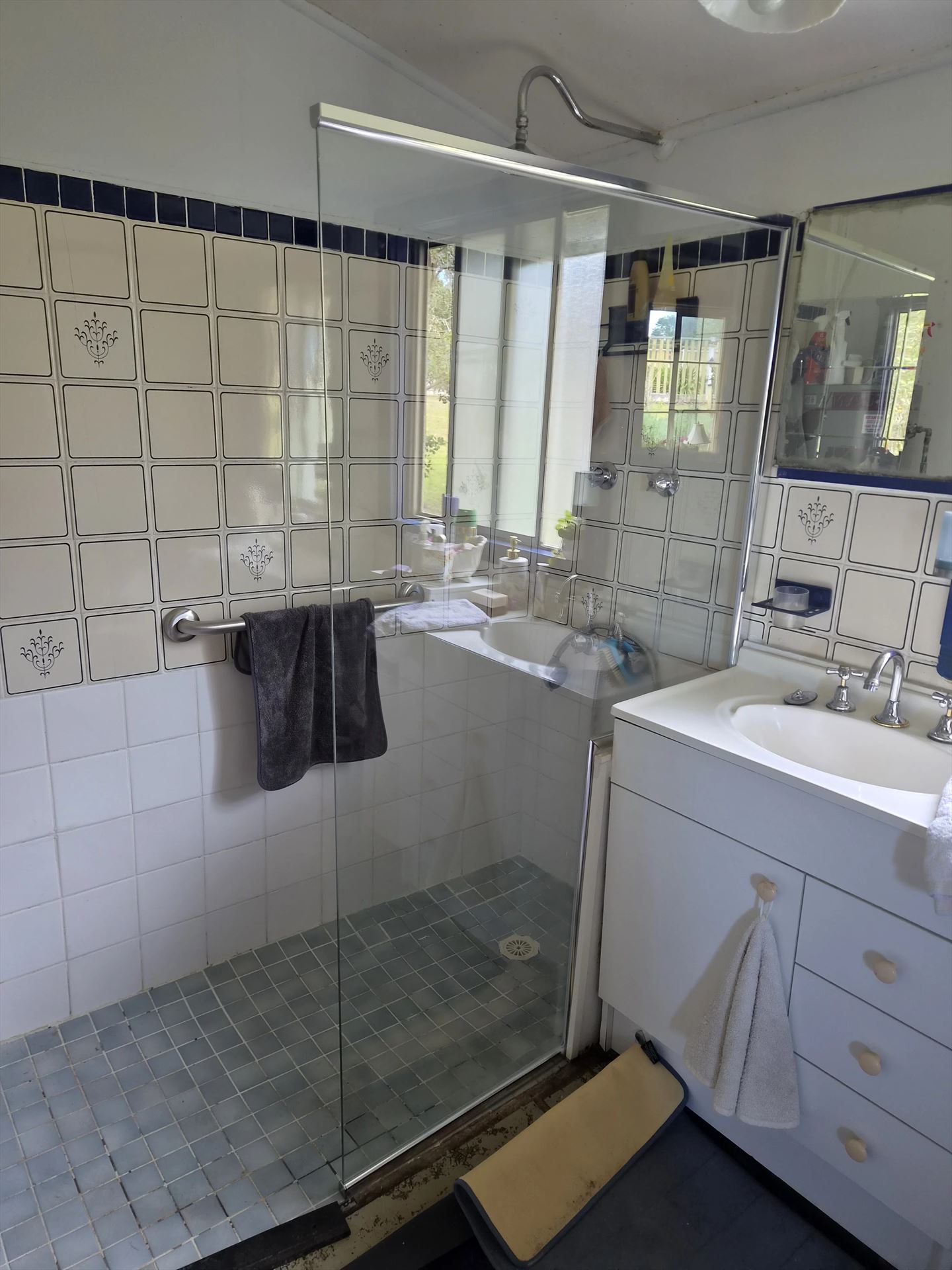 frameless shower screen with chrome hardware installed in Mitchell Park Rd by Showerland