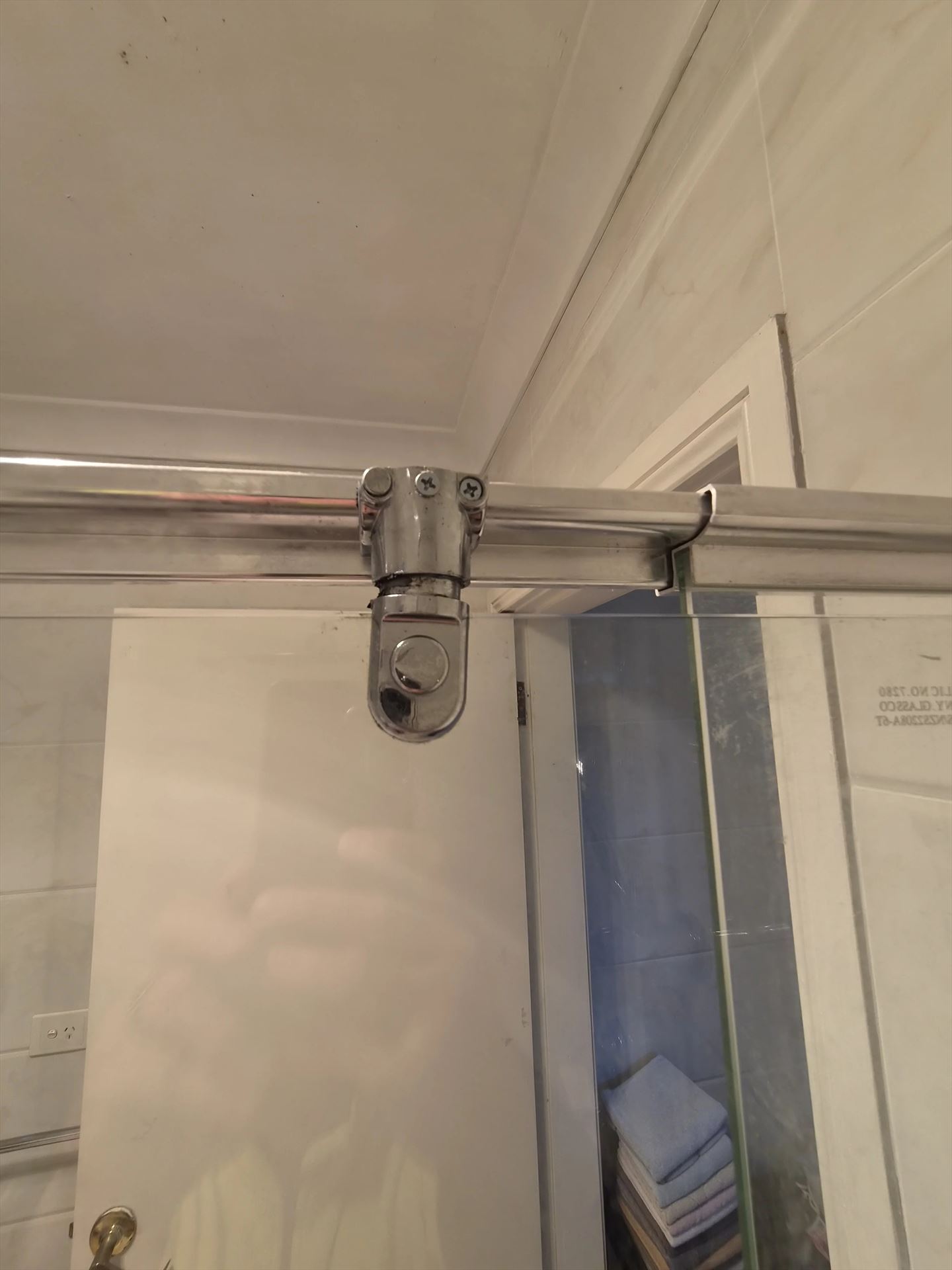 semi shower screen with chrome hardware installed in West Ryde by Showerland