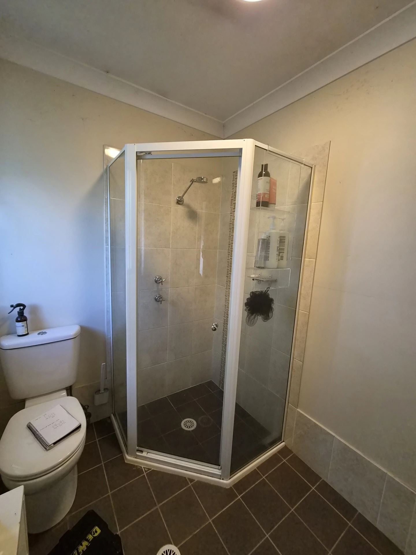 fully shower screen with white hardware installed in Asquith by Showerland