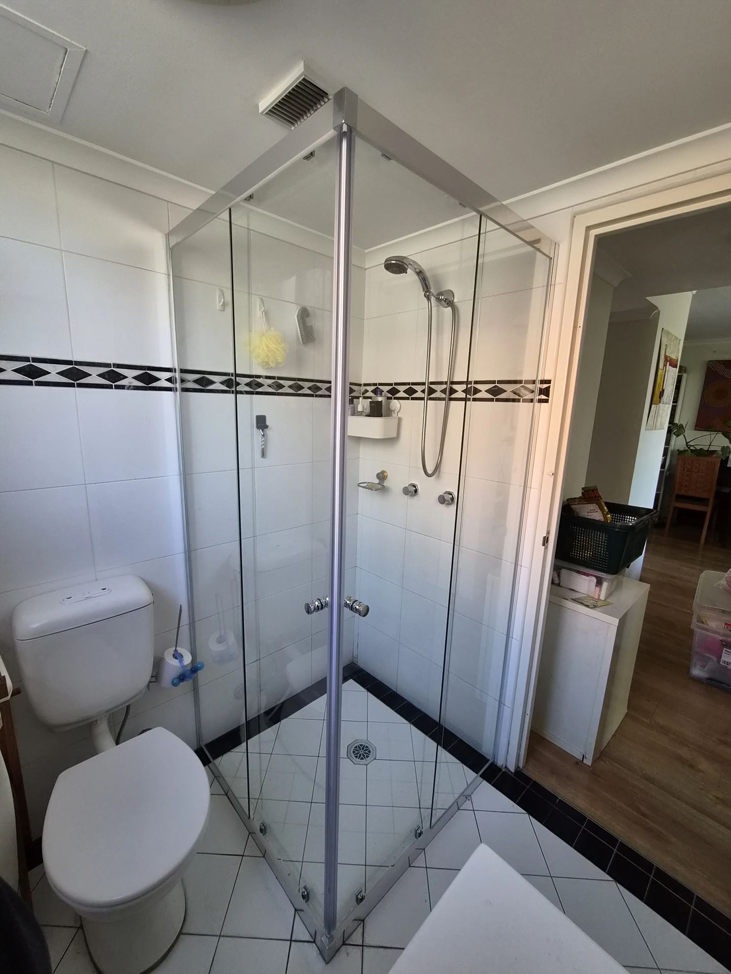 semi shower screen with chrome hardware installed in Strathfield by Showerland