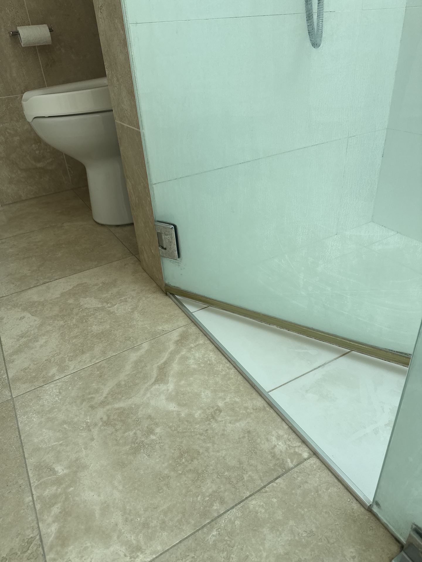 frameless shower screen with chrome hardware installed in Cremorne by Showerland