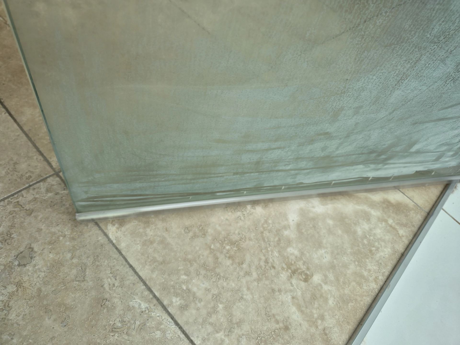 frameless shower screen with chrome hardware installed in Cremorne by Showerland