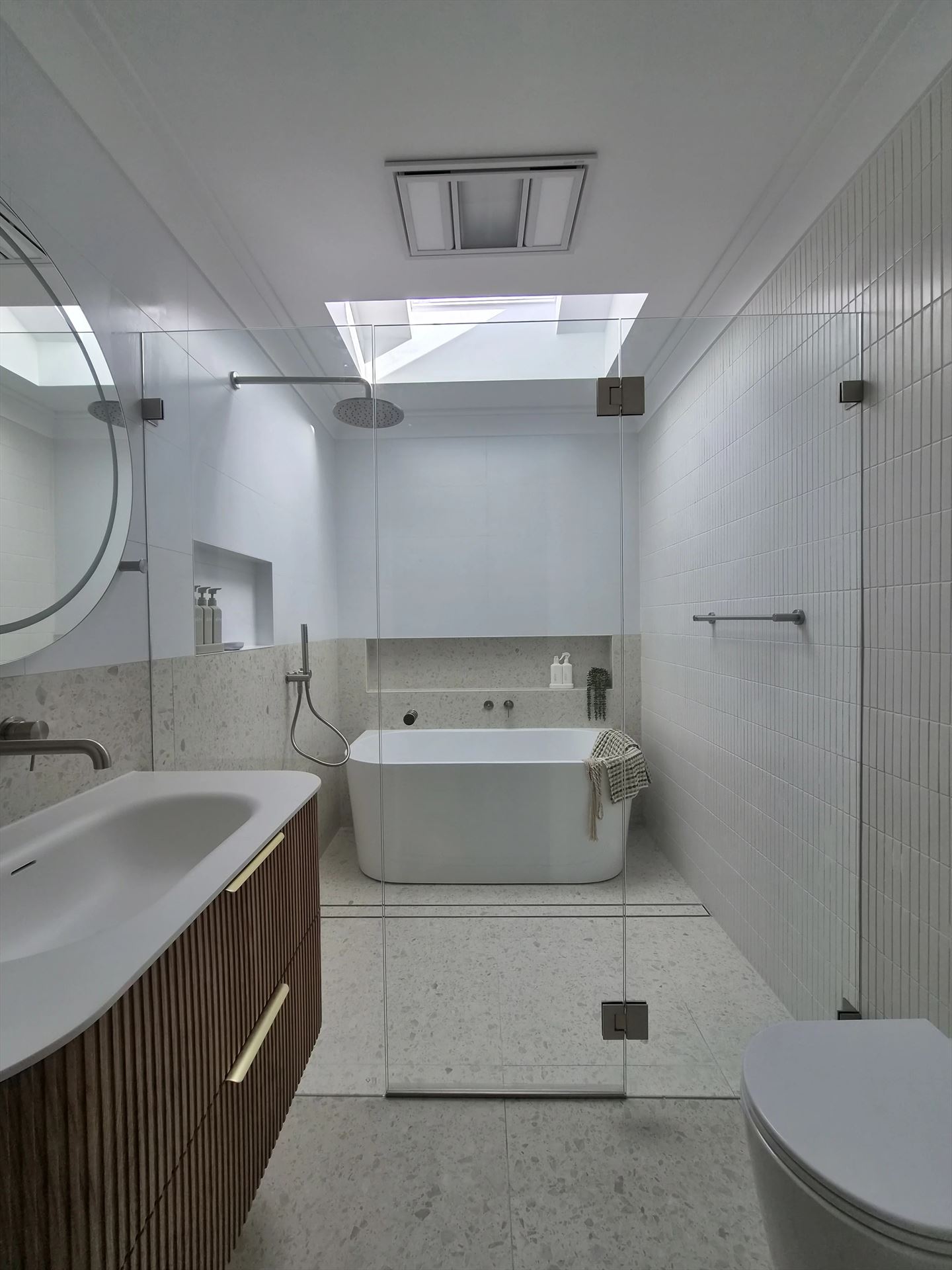 frameless shower screen with chrome hardware installed in Northmead by Showerland