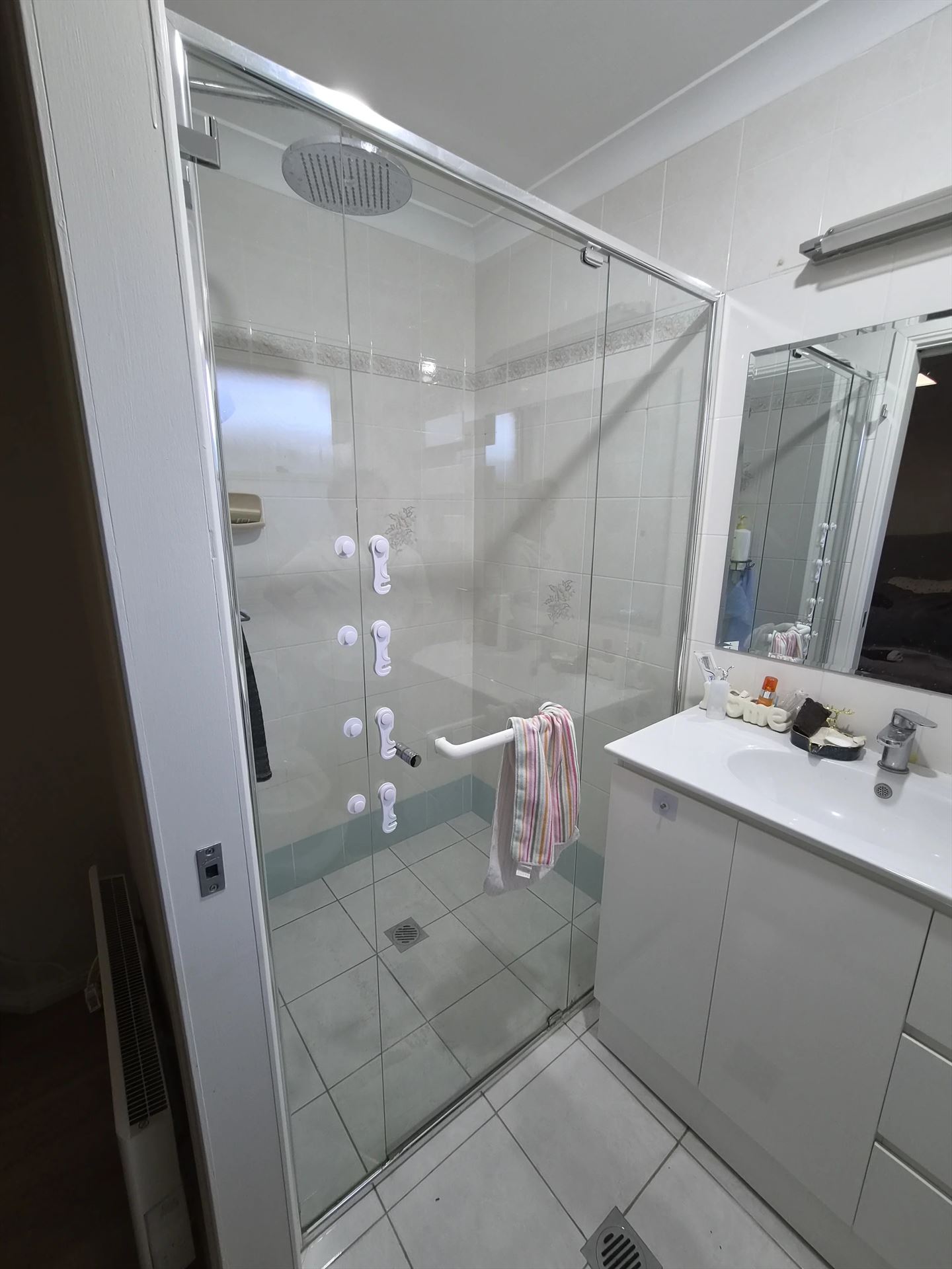 fully shower screen with white hardware installed in Pennant Hills by Showerland