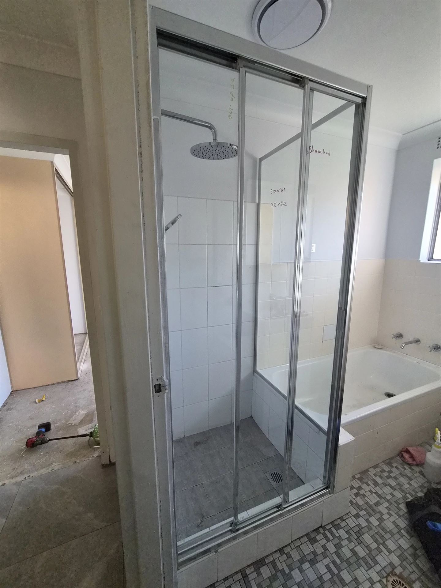 fully shower screen with chrome hardware installed in North Parramatta by Showerland