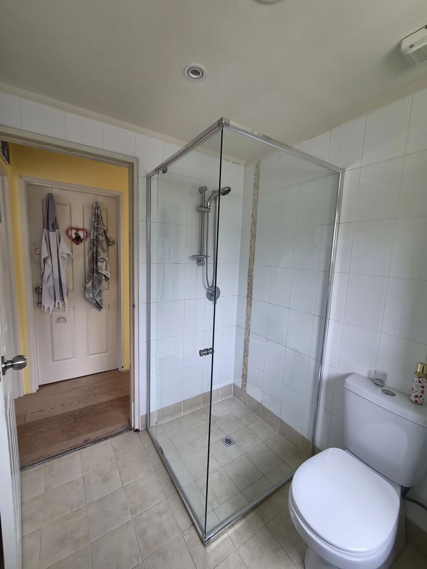 fully shower screen with chrome hardware installed in Sydney by Showerland