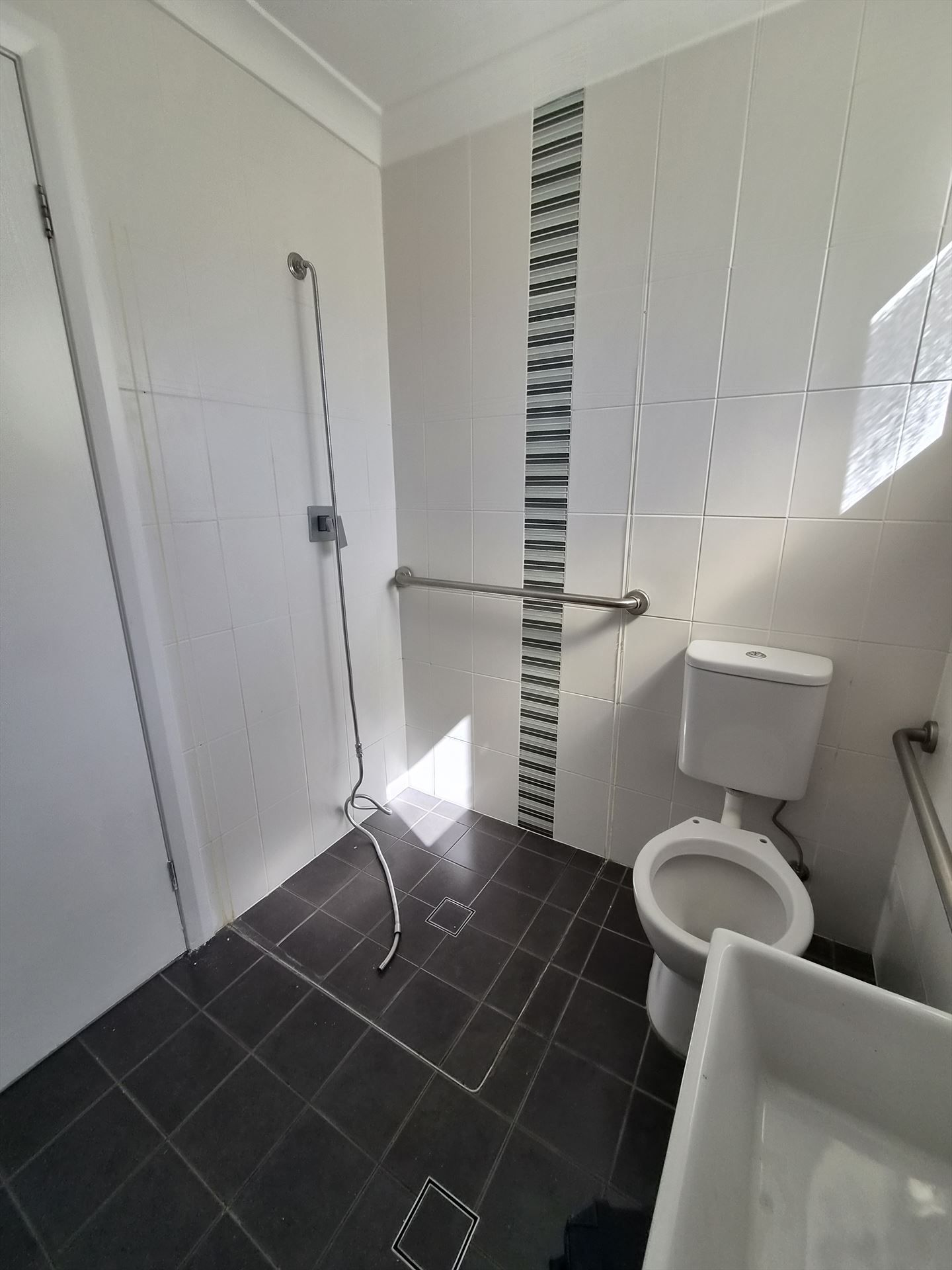 Bathroom before frameless shower screen install in Georges Hall