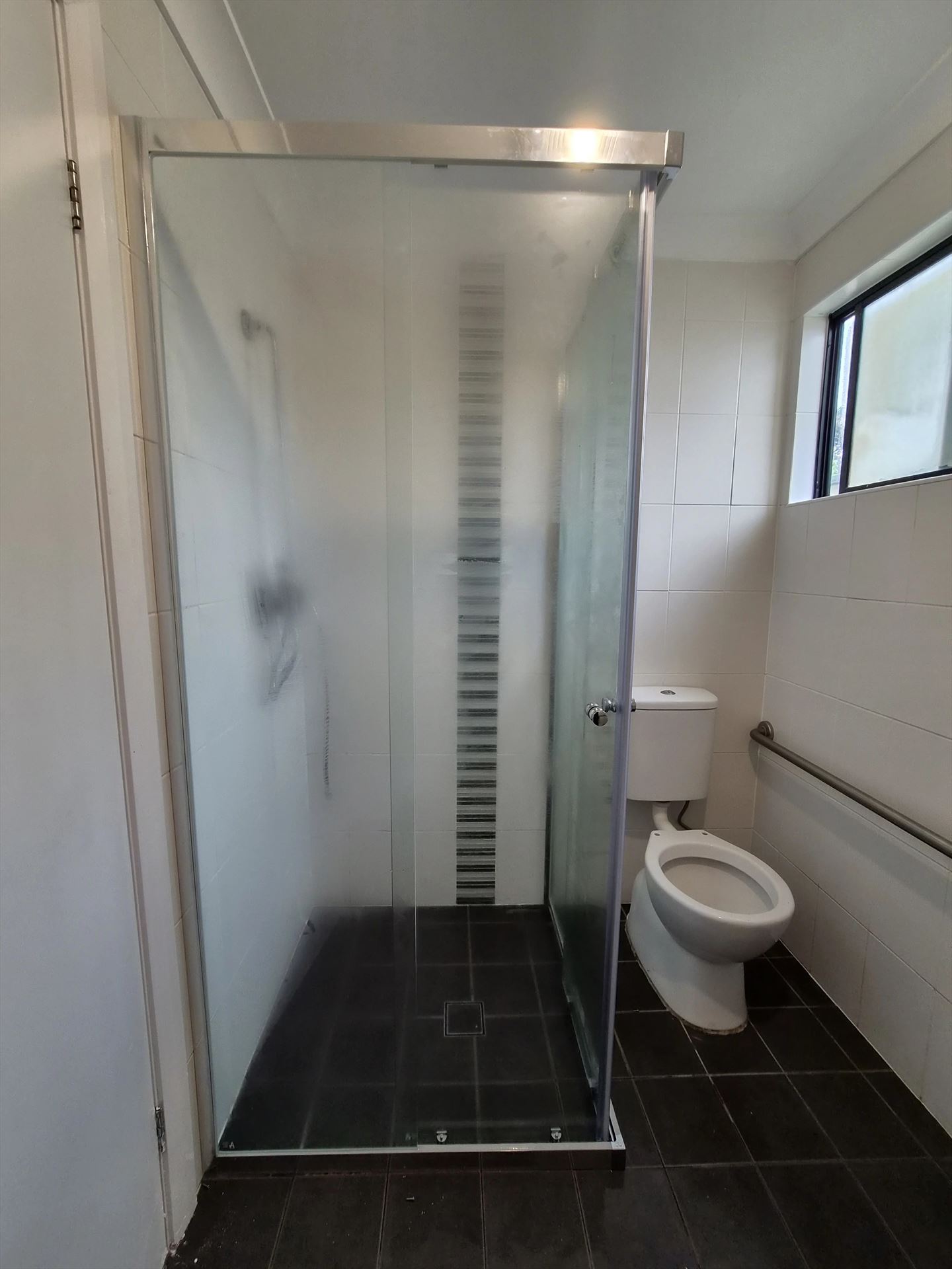 fully shower screen with chrome hardware installed in Georges Hall by Showerland
