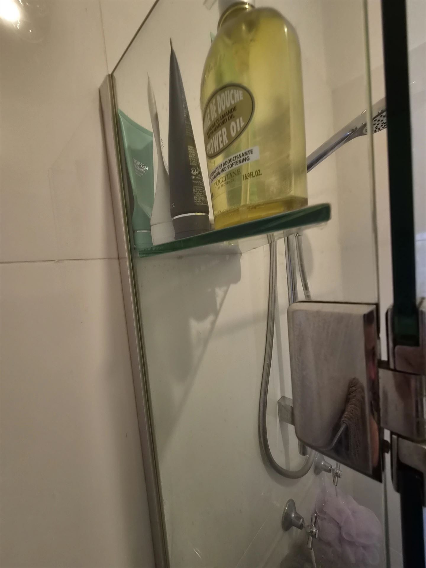 frameless shower screen with chrome hardware installed in Haberfield by Showerland