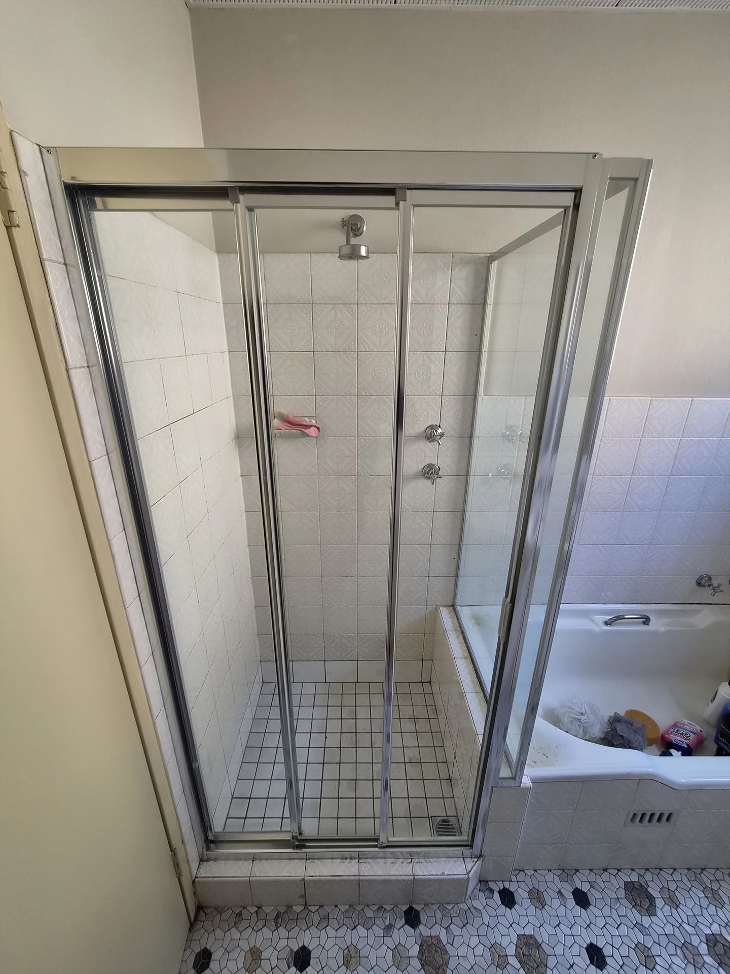 fully shower screen with chrome hardware installed in Carlton by Showerland