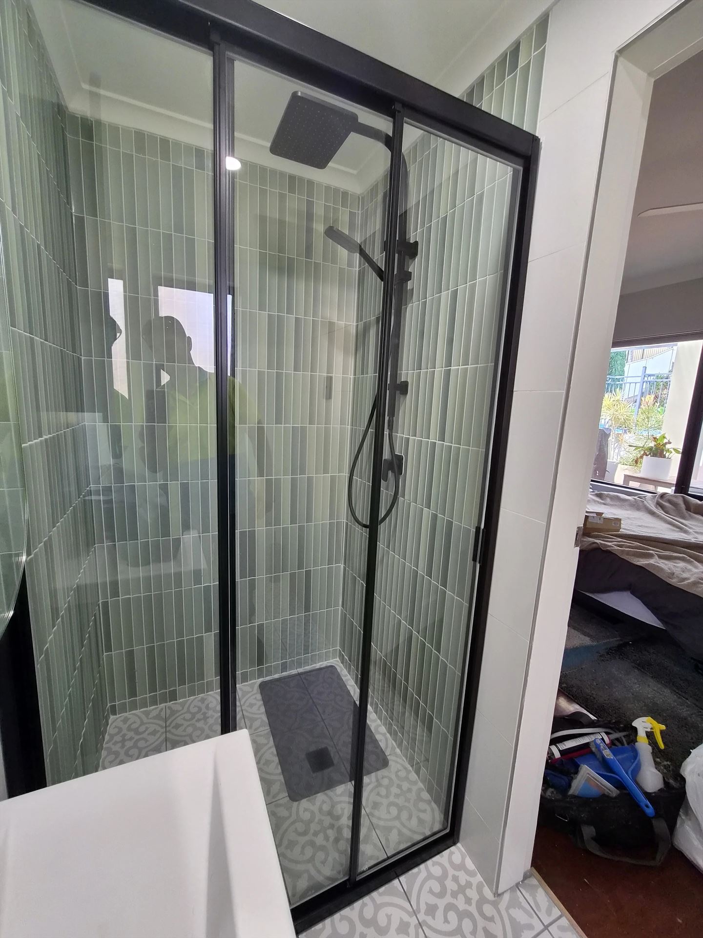 semi shower screen with black hardware installed in Taren Point by Showerland
