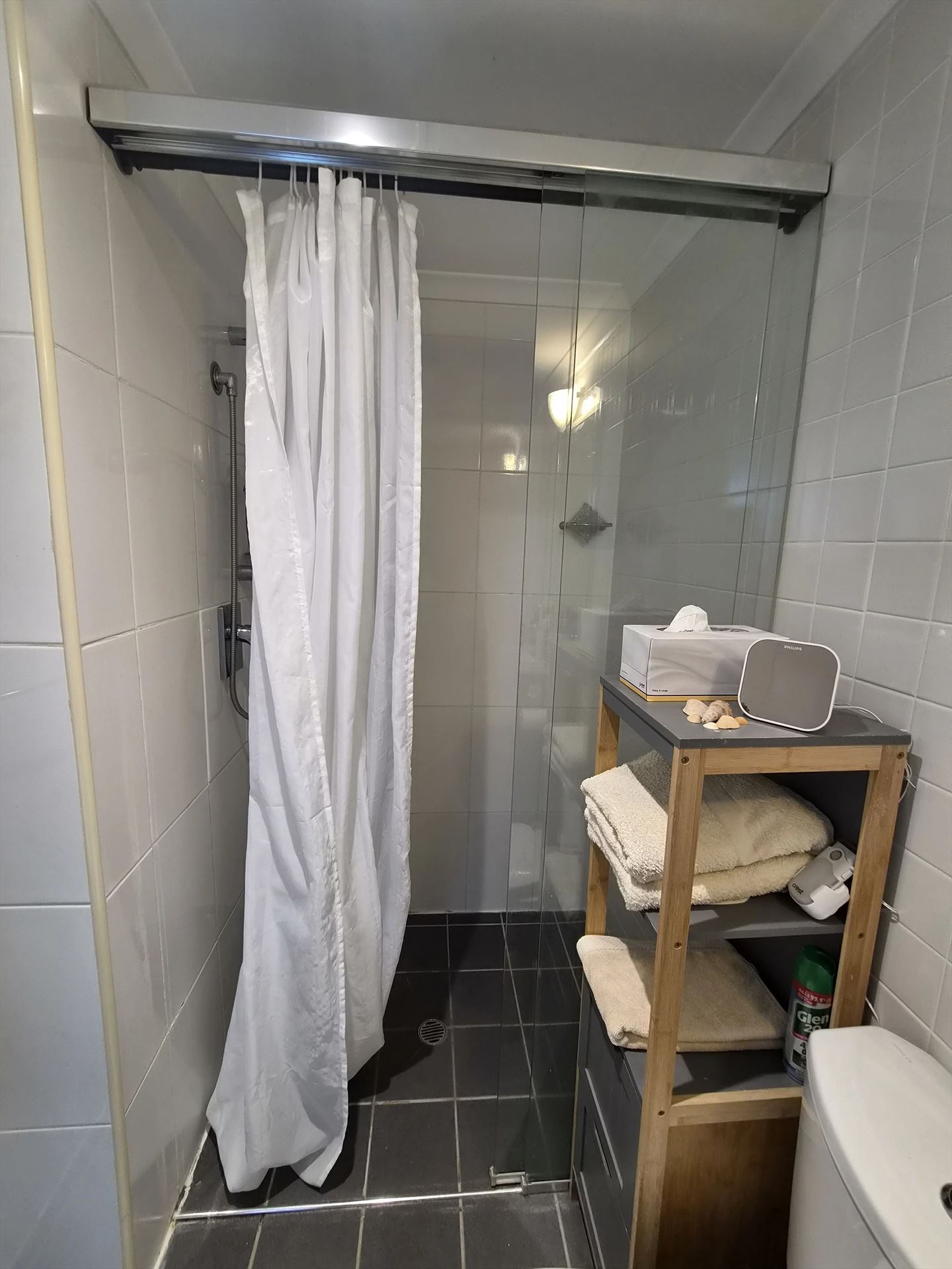 semi shower screen with chrome hardware installed in Sydney by Showerland