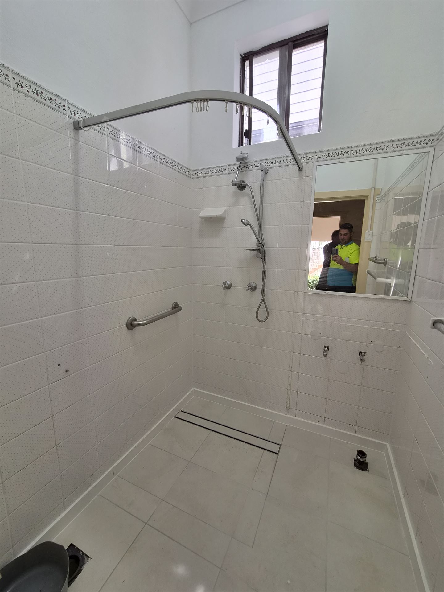 Bathroom before frameless shower screen install in Concord West