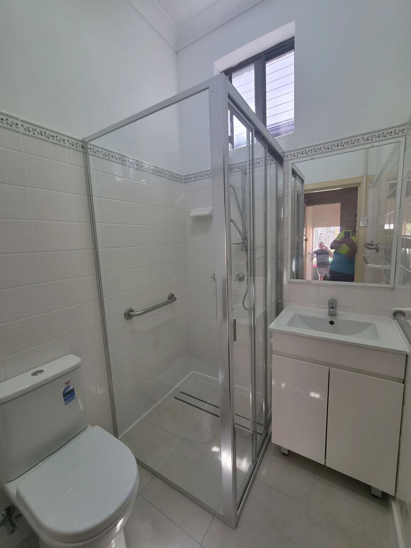 fully shower screen with chrome hardware installed in Concord West by Showerland