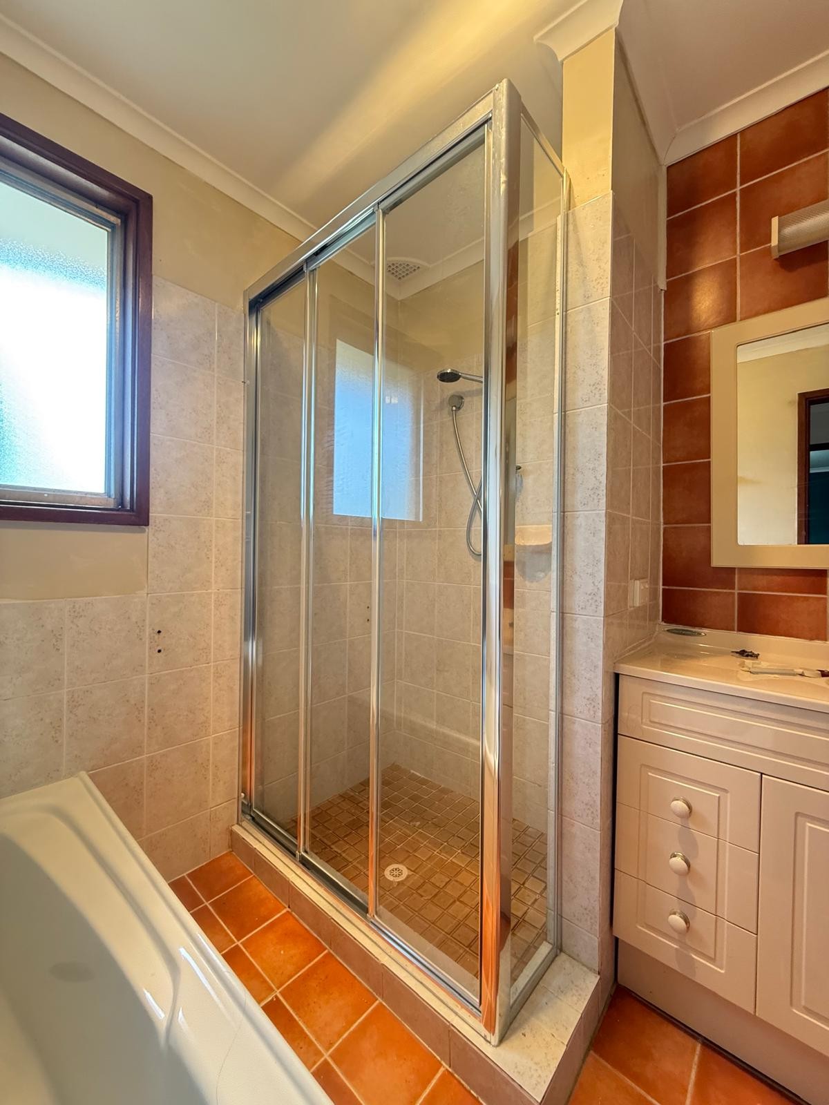 Custom corner shower screen with short return panel, chrome, Sydney