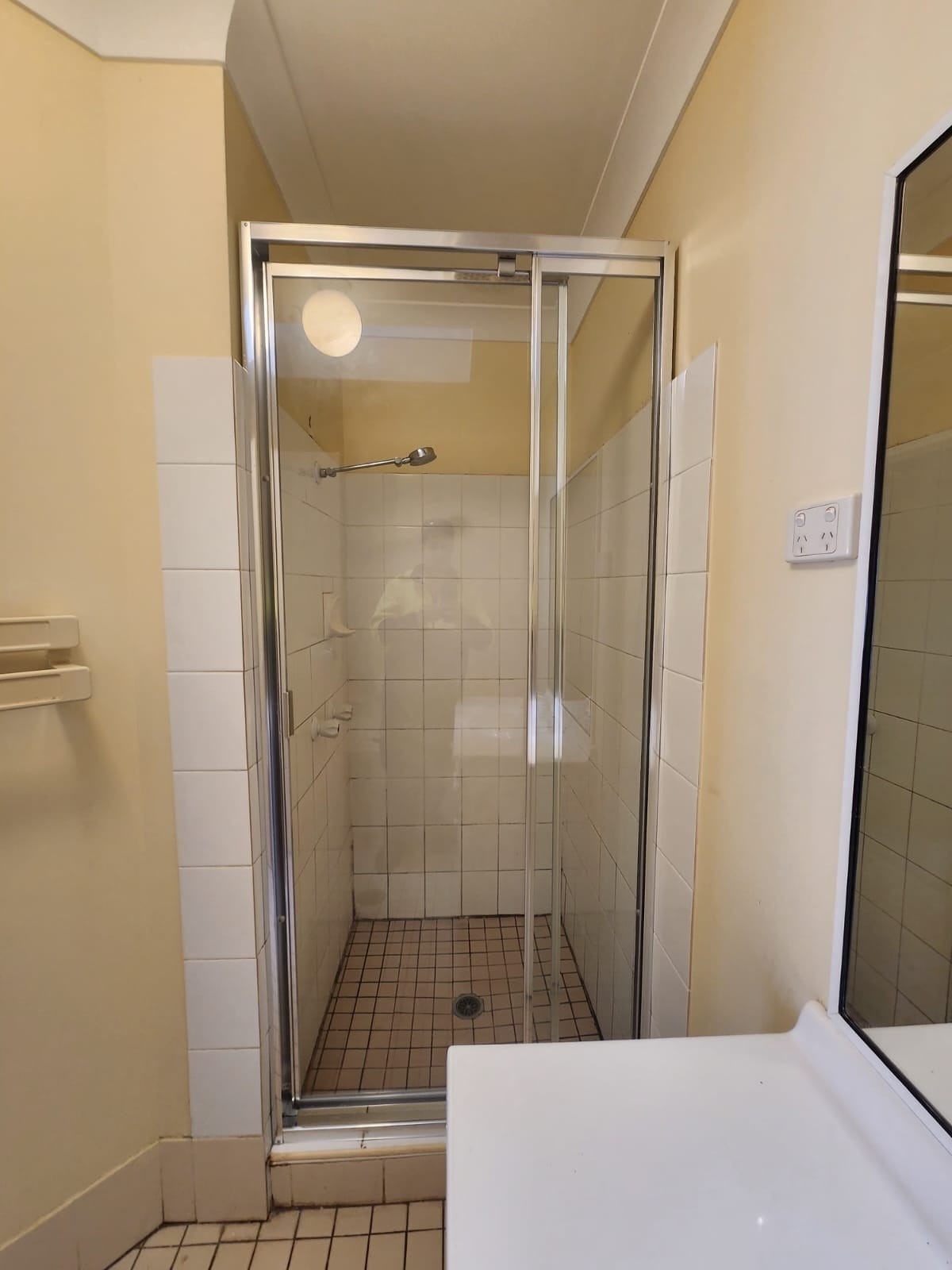 Wall-to-wall fully framed shower screen with pivot door Sydney