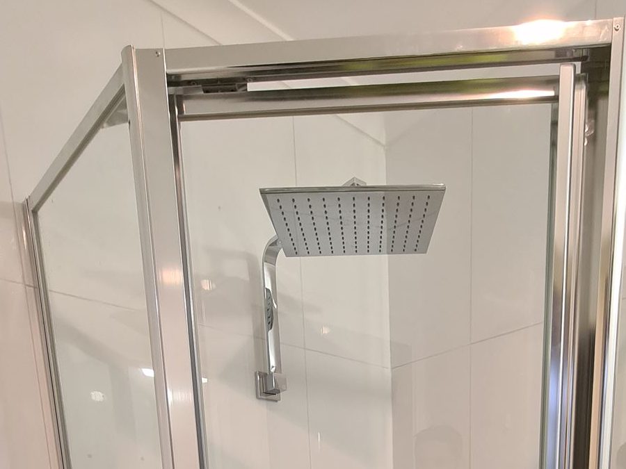 Pivot hinge on a framed shower screen in Horningsea Park