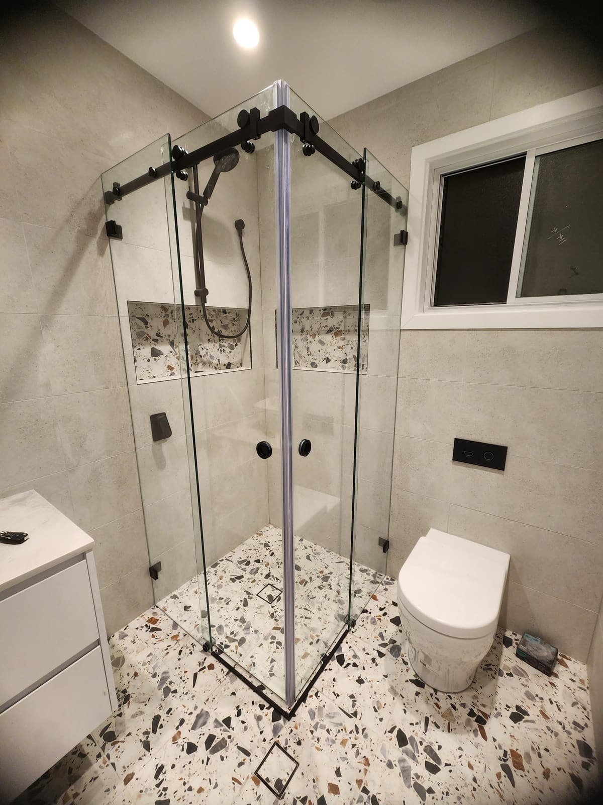 Frameless shower screen installed by Showerland Sydney